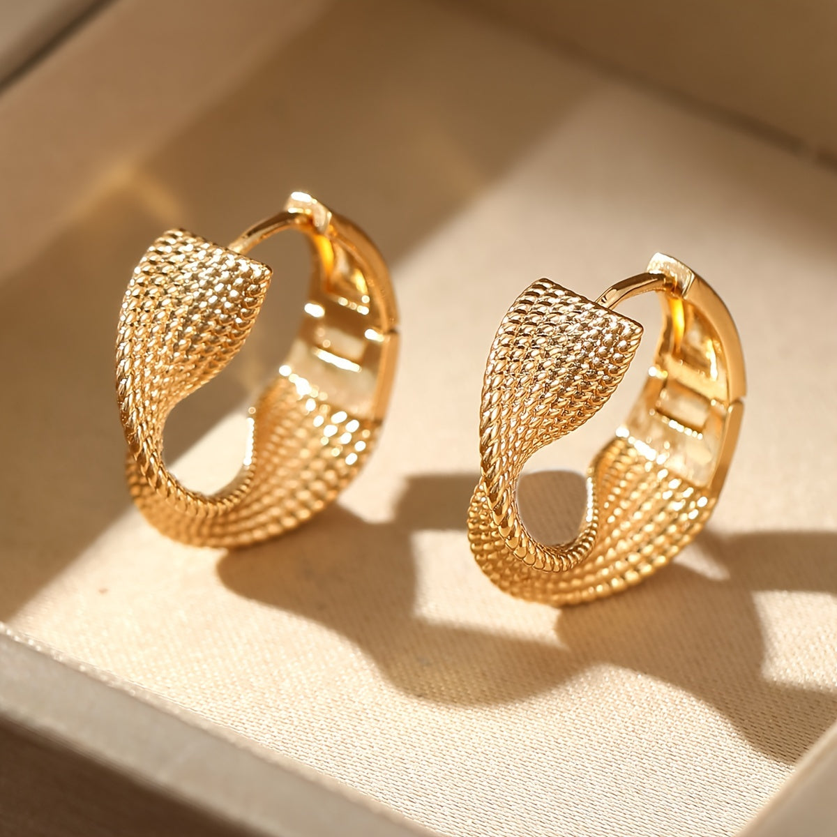 Elegant Wave Earrings in Gold