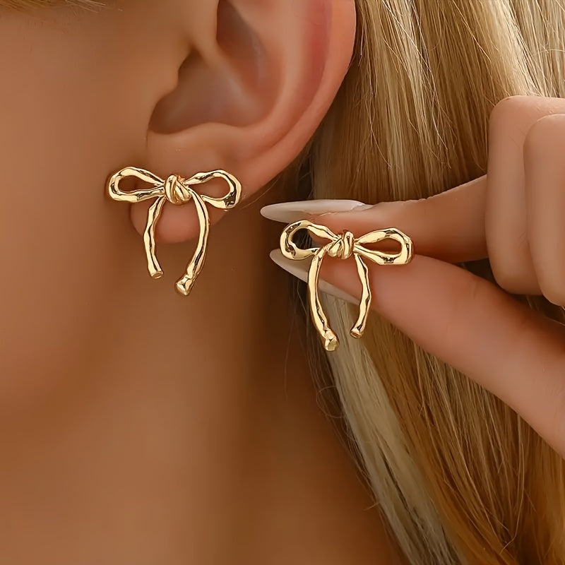 Elegant Bow Earrings in Gold